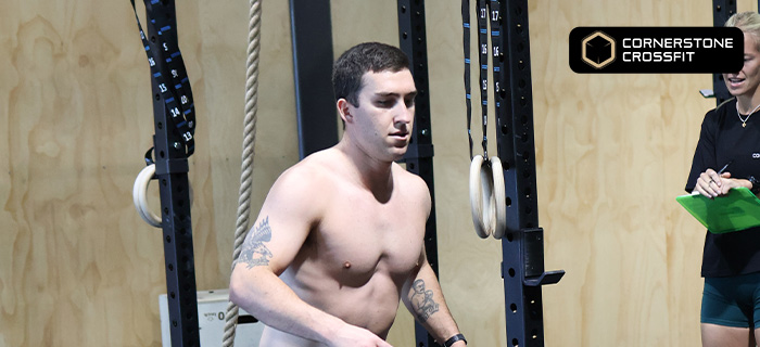 HYROX athlete demonstrating mental and physical endurance during a fitness competition